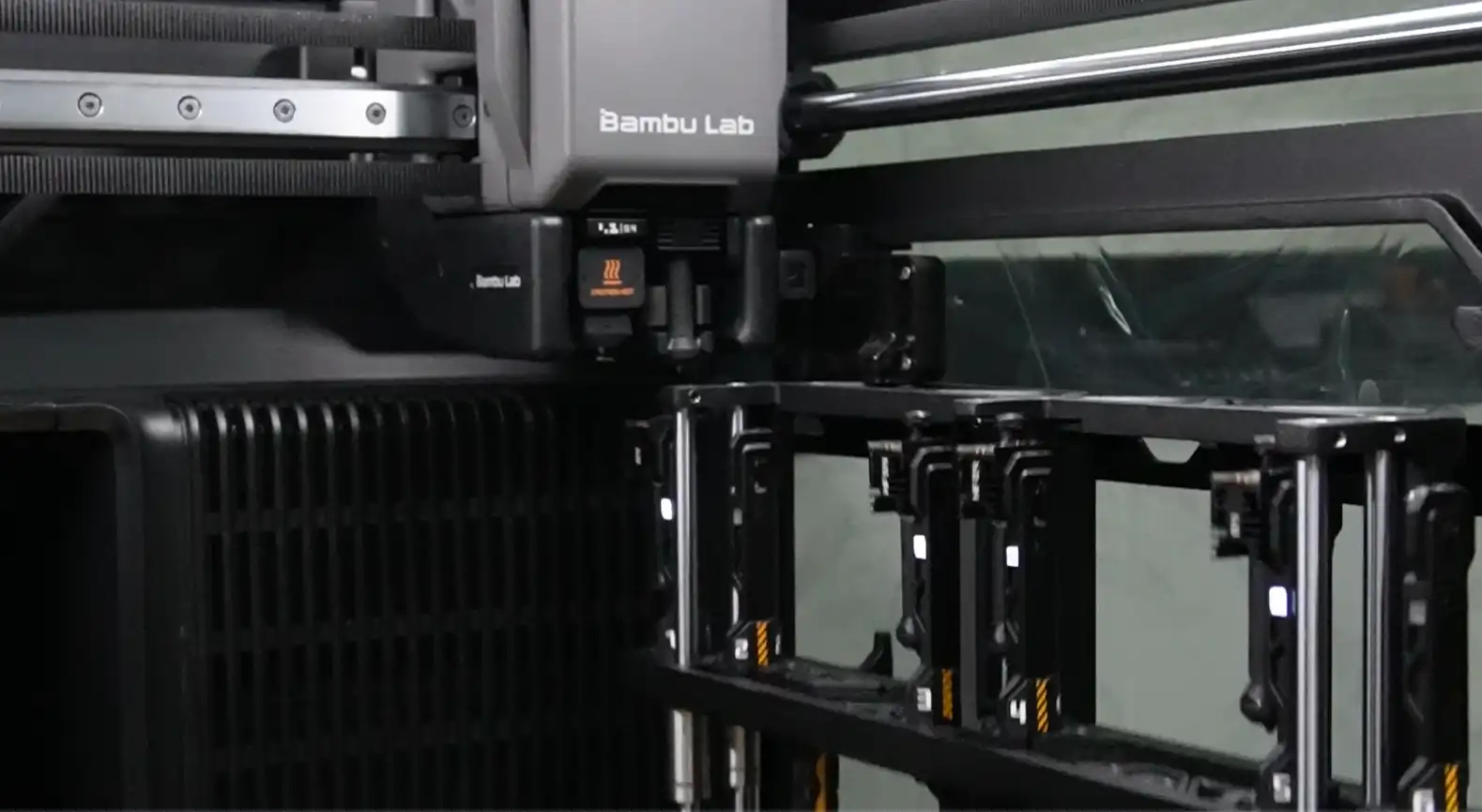 Bambu Lab H2C printhead positioned near the Vortek hotend switching rack